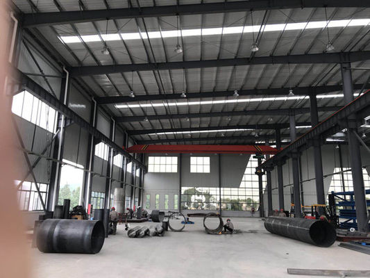 Qingdao Almacén de acero prefabricado de alta calidad Edificio de estructura de acero diseñado Taller personalizado