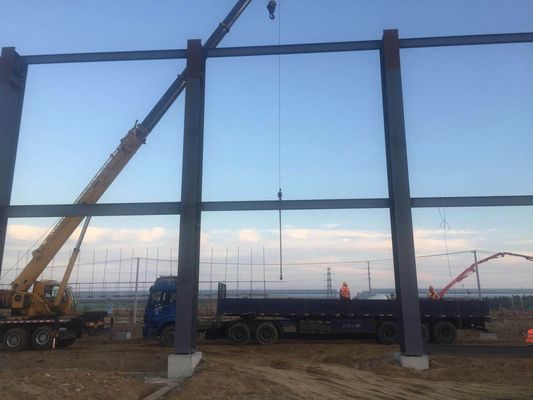 Sección H Edificio de almacén prefabricado de acero laminado en caliente galvanizado económico industrial peso ligero gran envergadura