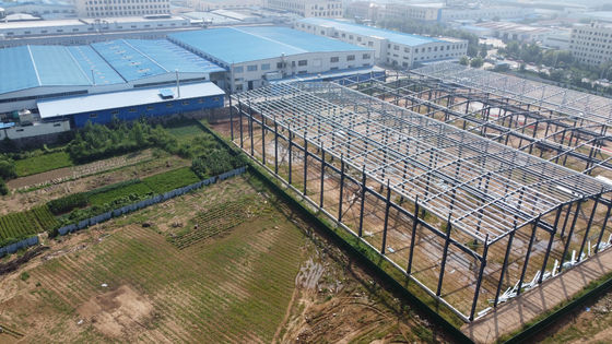 Estructura de marco de acero de 100 m*30 m Edificios prefabricados de almacenes de acero