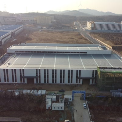 Construcción de almacén prefabricado con estructura de acero y vigas de sección H