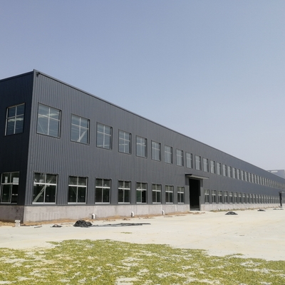 Almacén prefabricado de acero con sección H, puente grúa y aislamiento térmico